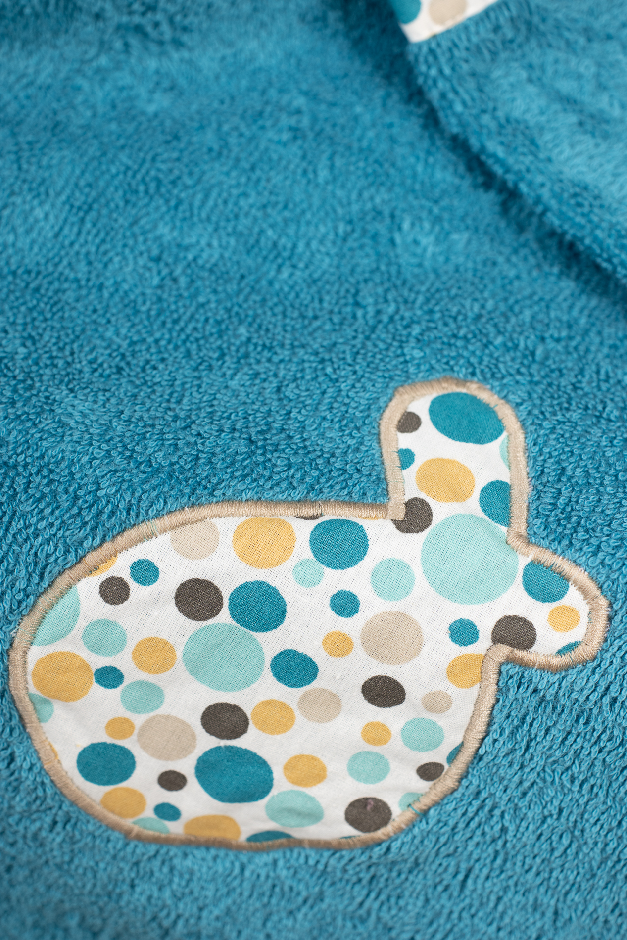 Détail cape de bain