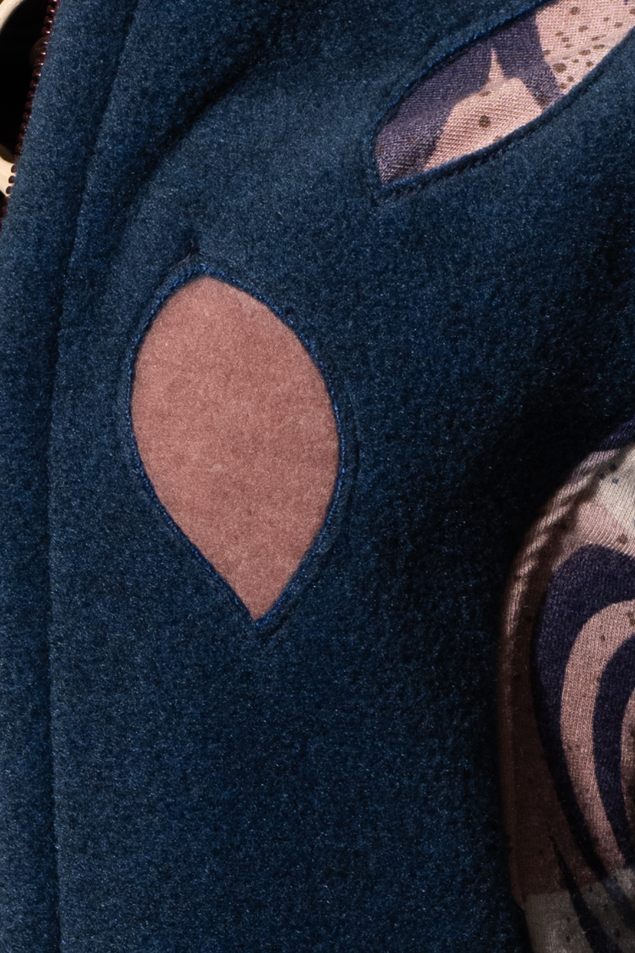 Détail veste capucine Détail veste capucine