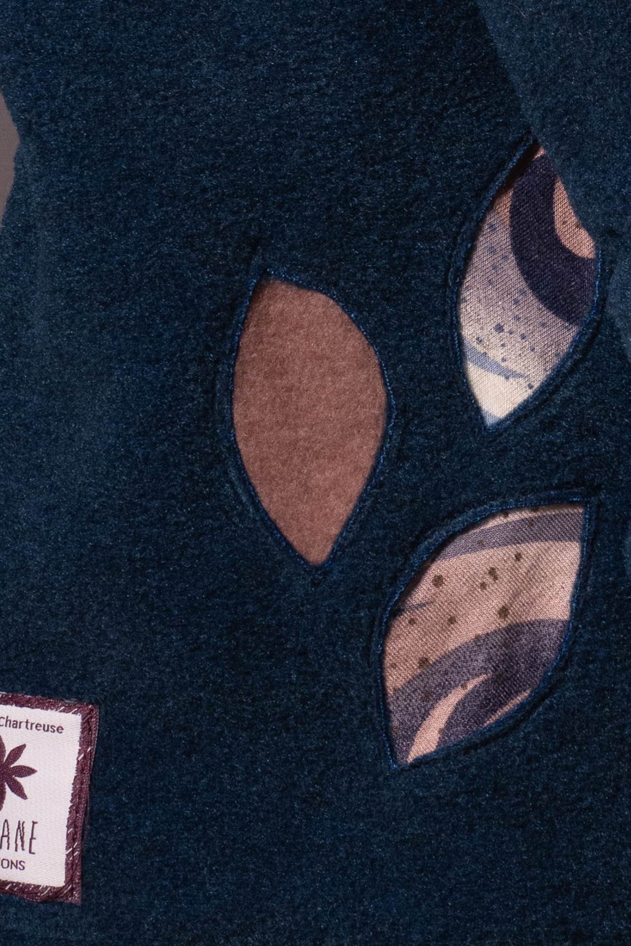 Détail veste capucine Détail veste capucine
