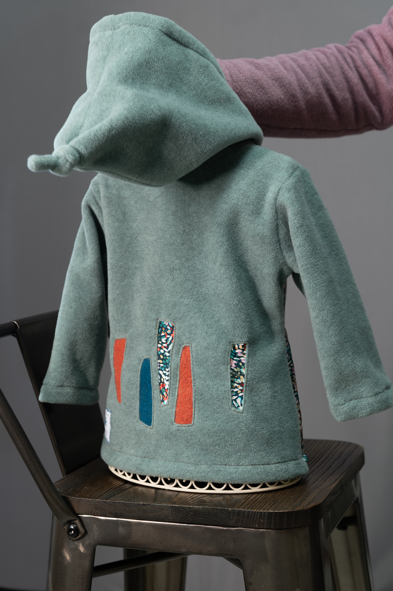 Veste polaire capucine