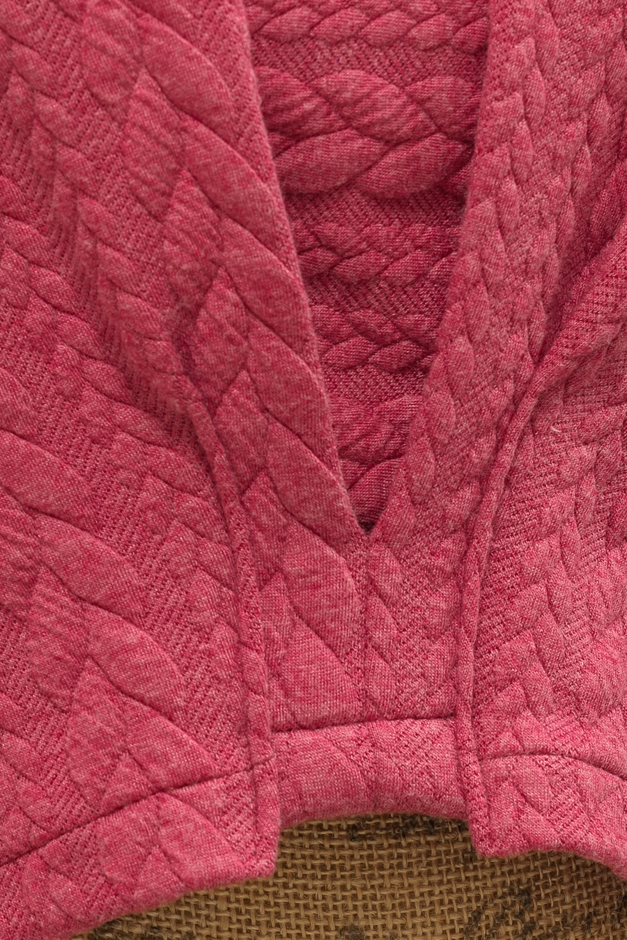 Détail pull court torsades